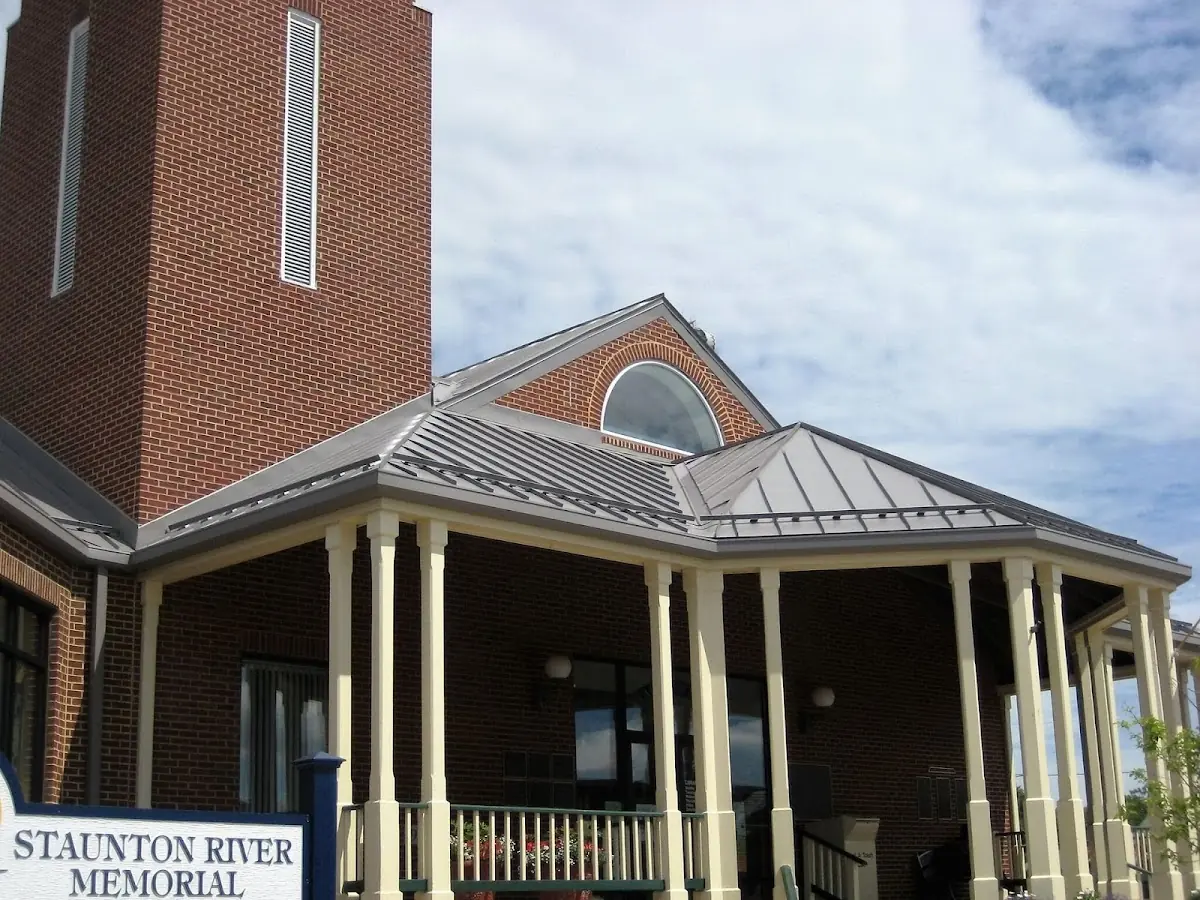 Skilled roofing craftsmen working on a residential roof in Starwood